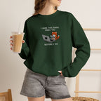 Model wearing forest green Before I Do embroidered cat sweatshirt, holding iced coffee