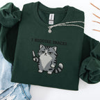 Navy embroidered cat sweatshirt with grumpy grey cat holding a knife, I Require Snacks text, flat lay