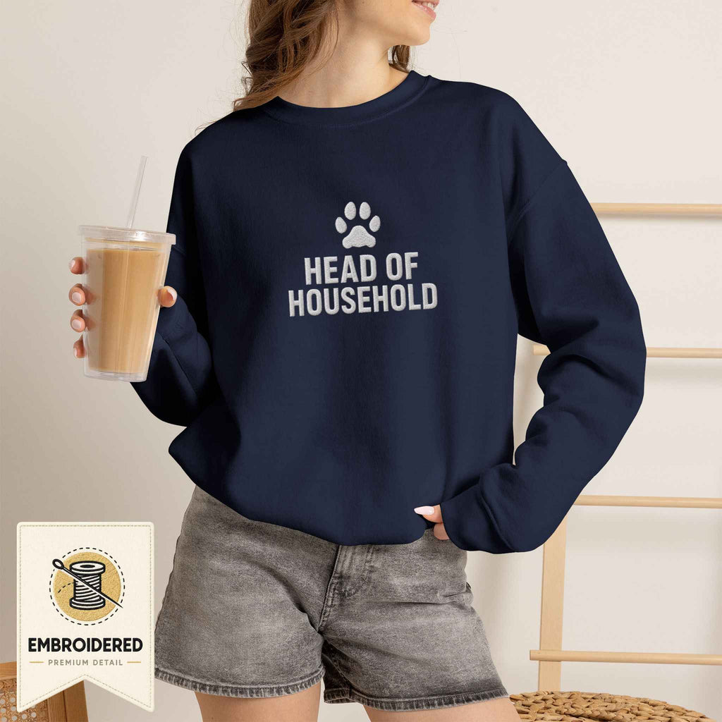 Woman wearing a navy embroidered Head of Household cat sweatshirt