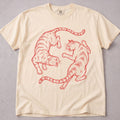 Ivory cat t-shirt with two cats play-fighting in red line art, funny cat lover tee on soft Comfort Colors cotton, flat lay front view