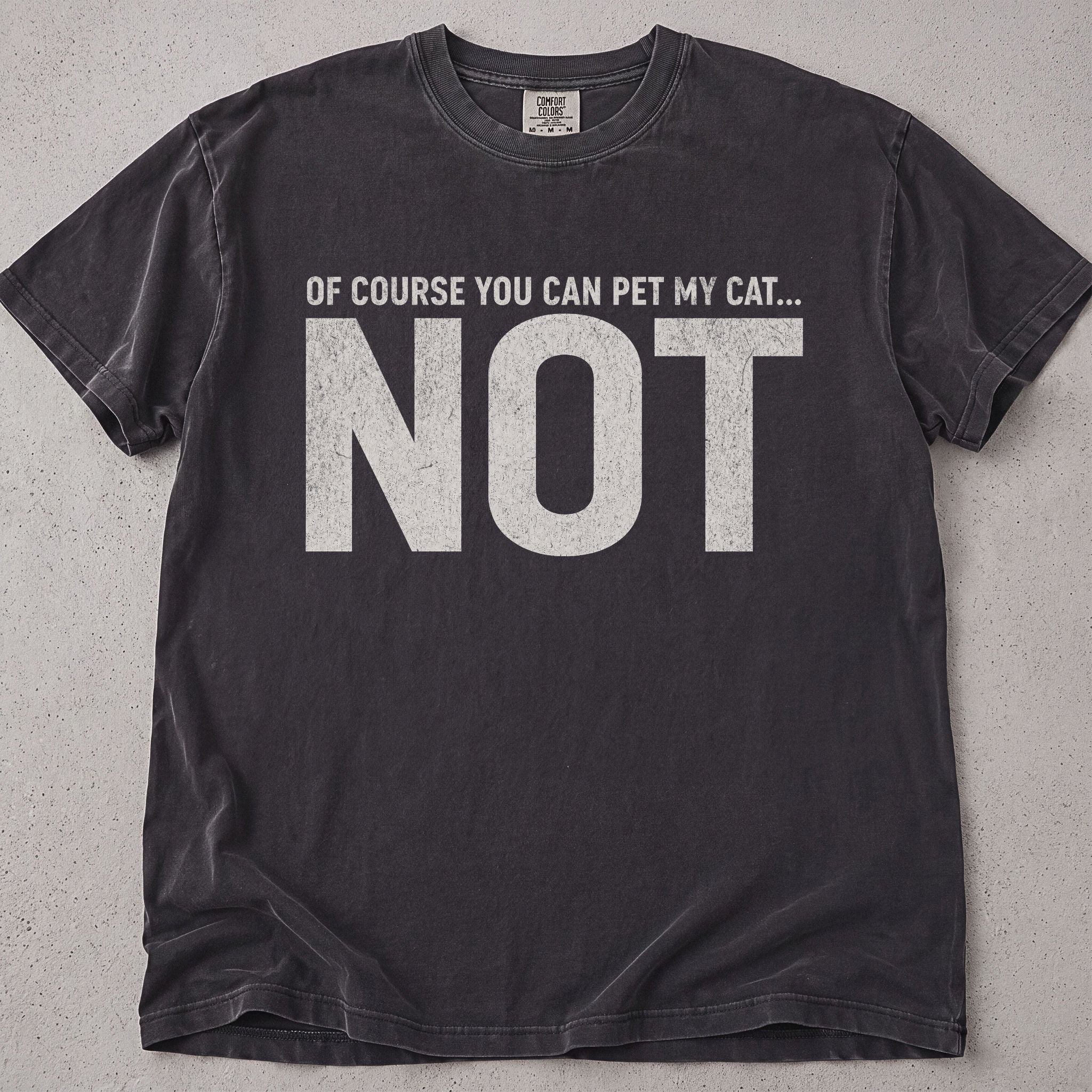 Pepper brown cat t-shirt with Of Course You Can Pet My Cat Not printed text graphic, funny cat lover tee on soft Comfort Colors cotton, flat lay front view
