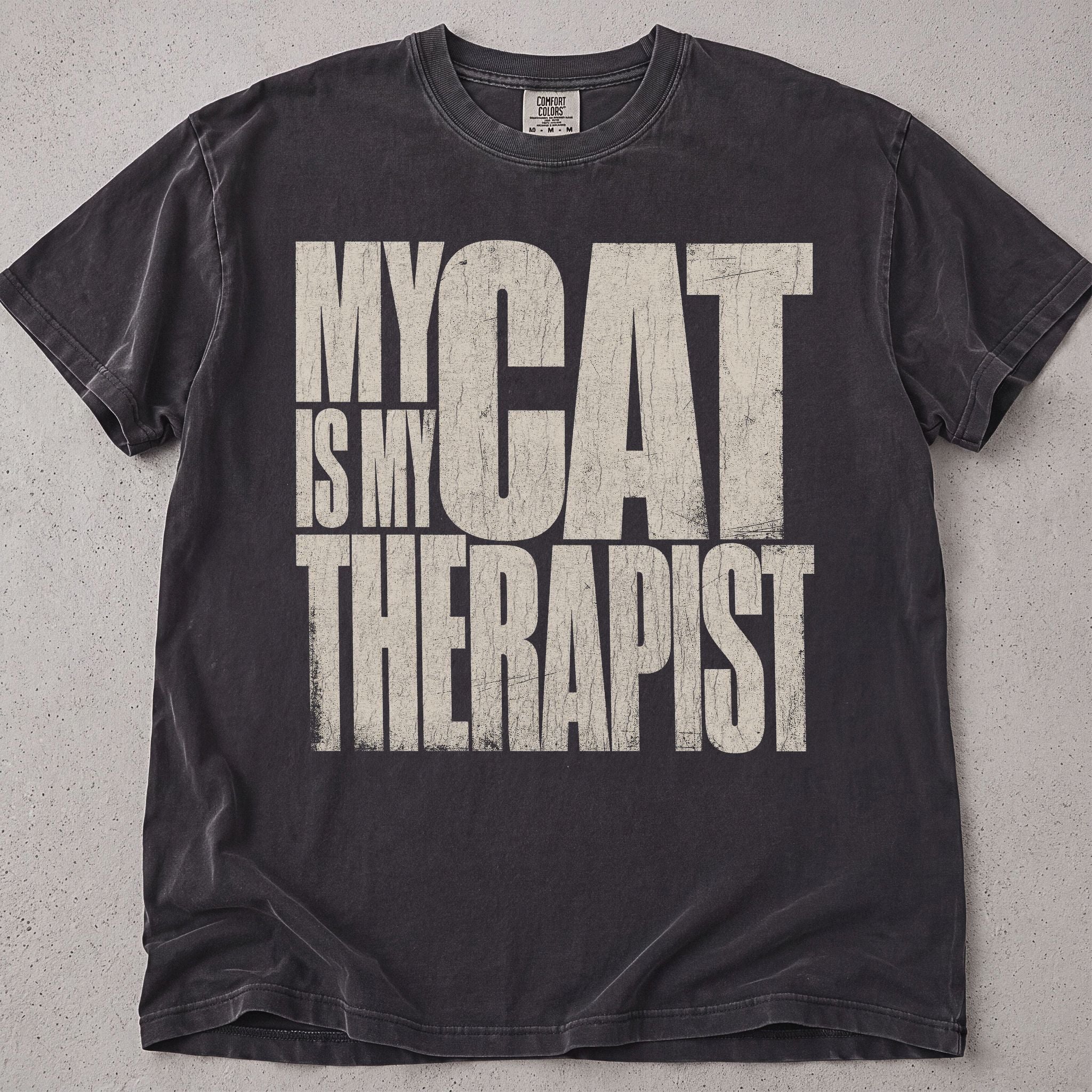 Pepper brown cat t-shirt with My Cat Is My Therapist printed text graphic, funny cat lover tee on soft Comfort Colors cotton, flat lay front view