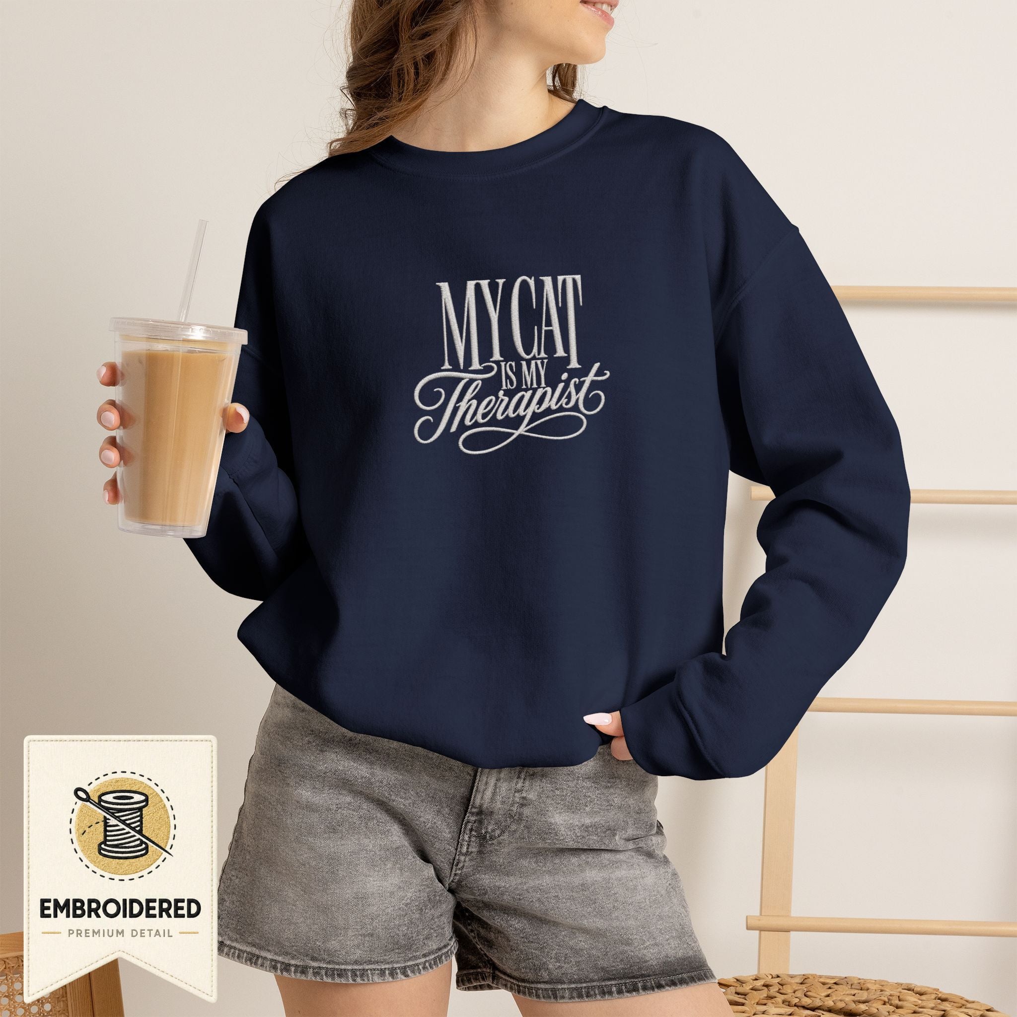 Navy embroidered My Cat Is My Therapist cat lover crewneck sweatshirt worn by a model