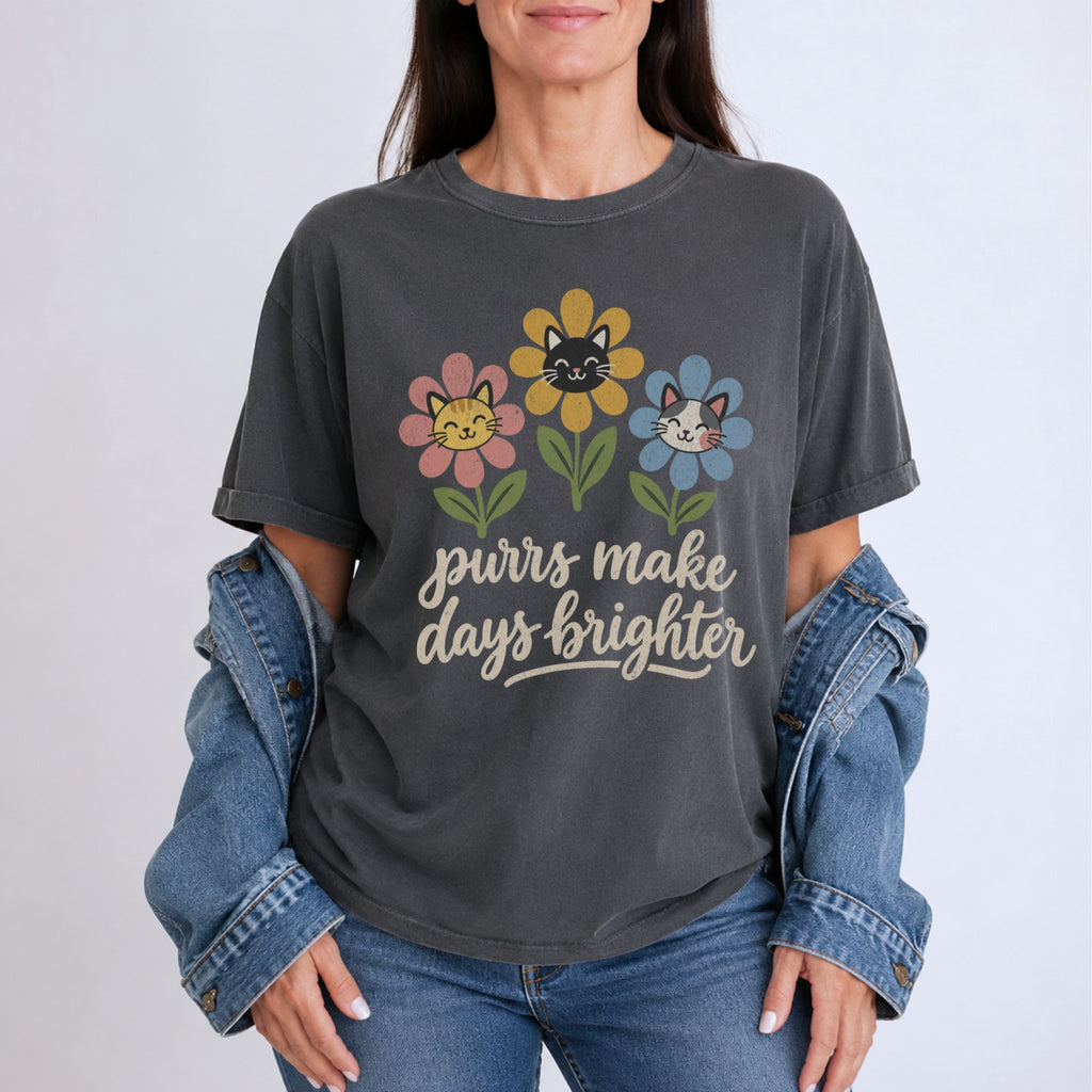 Woman wearing a Pepper Purrs Make Days Brighter t-shirt with a retro floral cat graphic