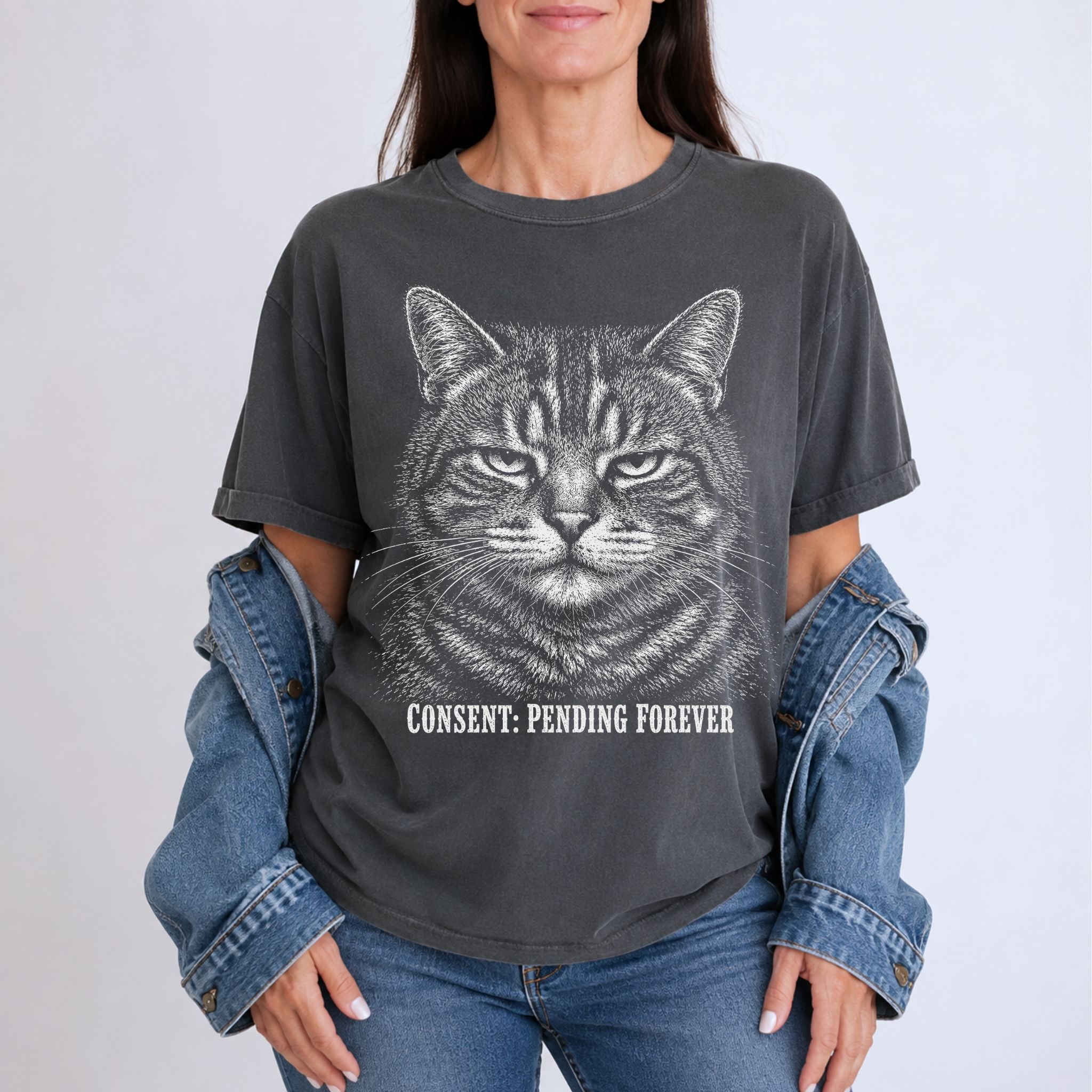 Woman wearing a Pepper Pending Forever t-shirt with a large tabby cat graphic