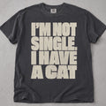 Flat lay of a black printed cat lover t-shirt with I Have A Cat graphic