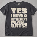 Flat lay of a black printed cat lover t-shirt with Retirement Plan Cats graphic