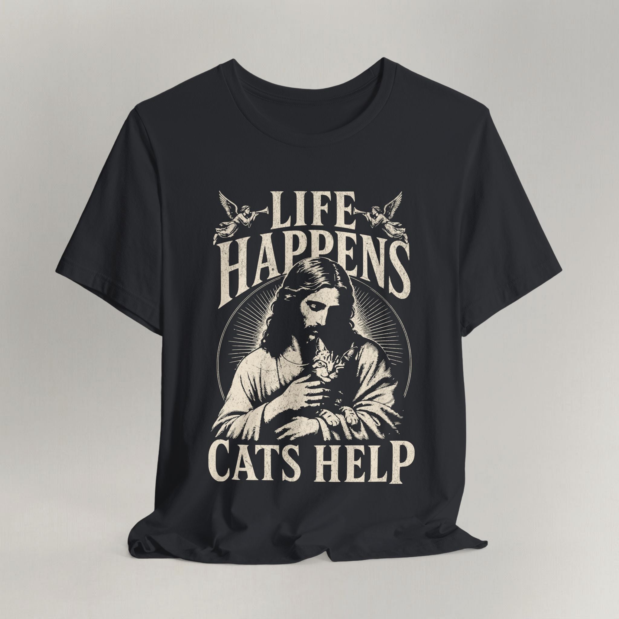 Vintage black cat t-shirt with a printed Life Happens Cats Help design and a faith illustration, shown flat