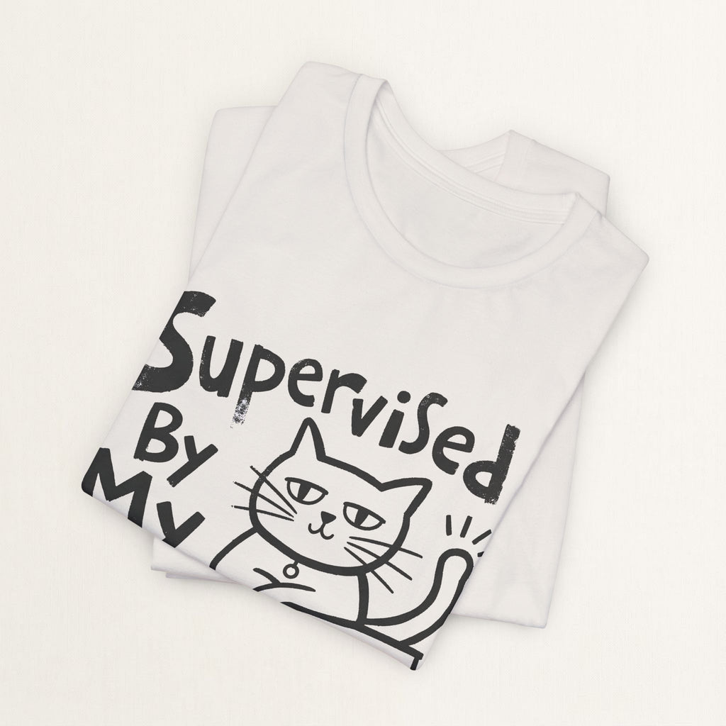 Folded vintage white Supervised By My Cat t-shirt with hand-drawn sketch graphic