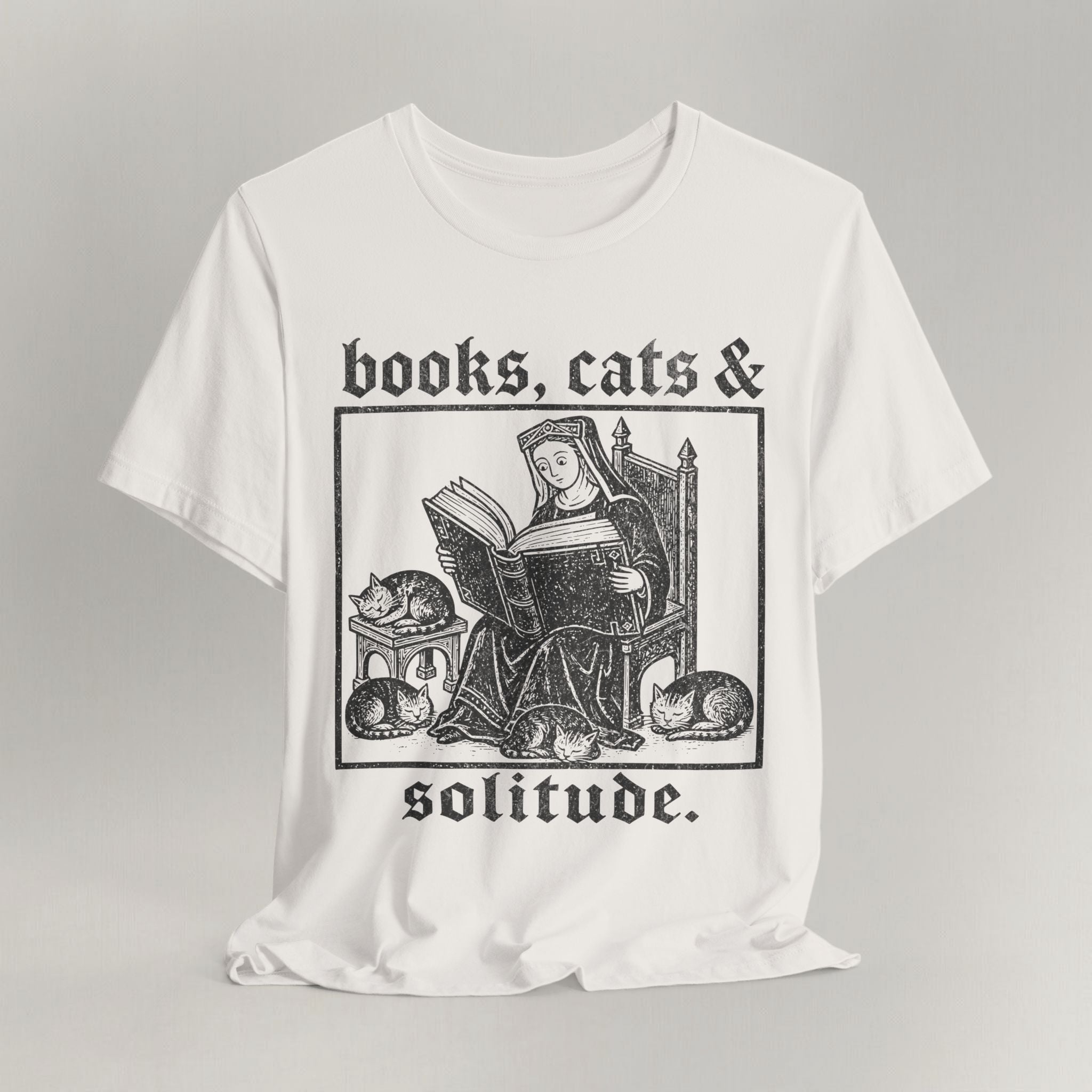 Vintage white cat t-shirt with a Books, Cats and Solitude vintage design, shown flat