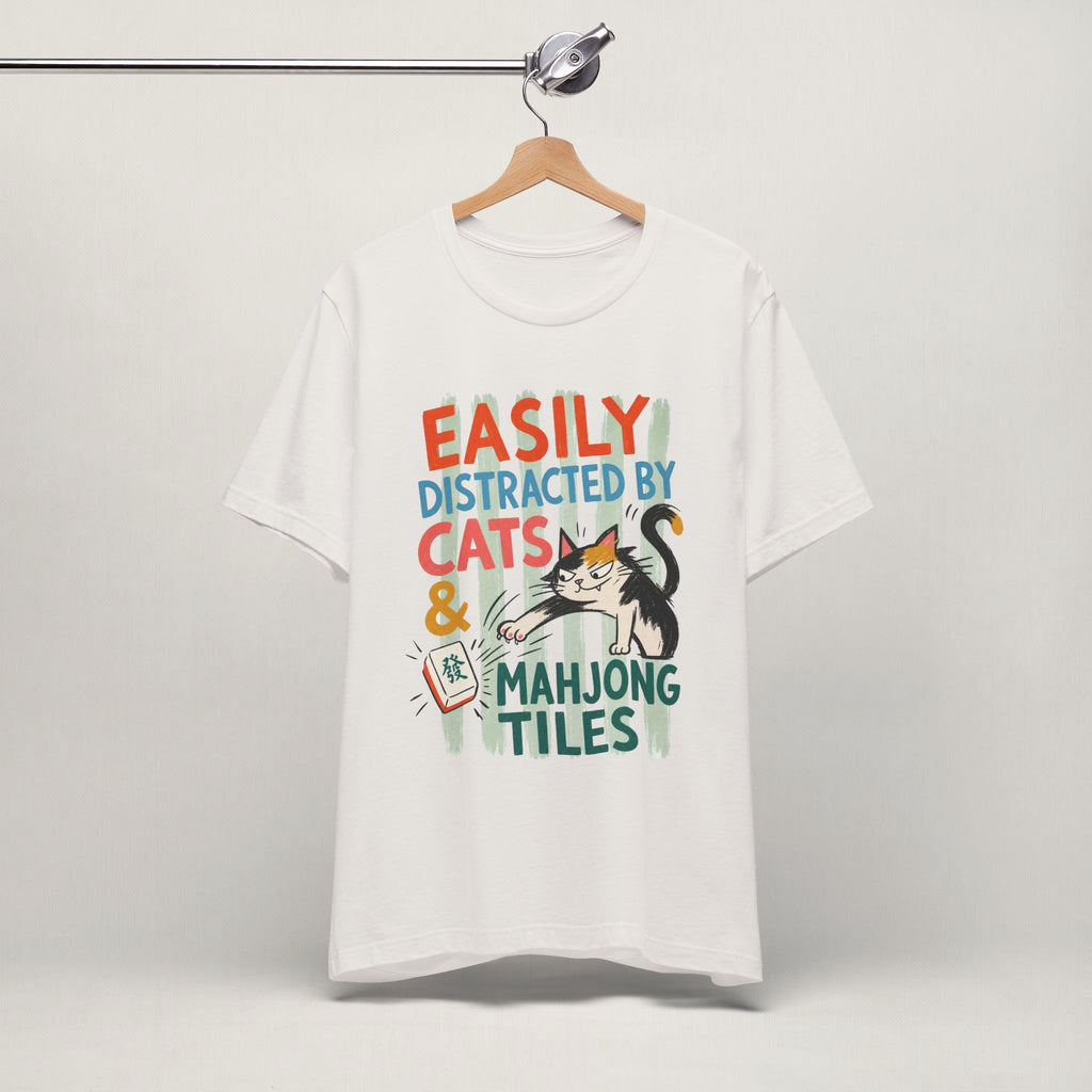 Vintage white Easily Distracted by Cats and Mahjong cat t-shirt on a hanger