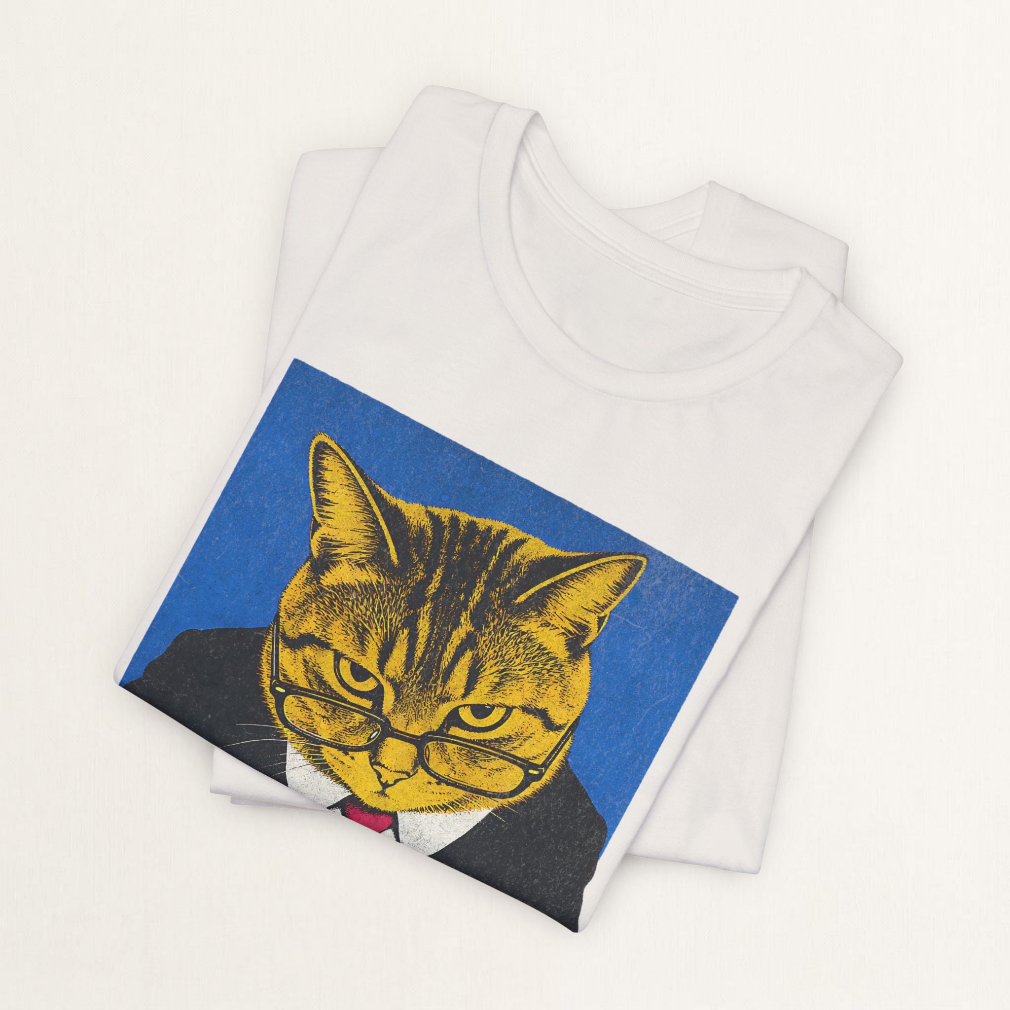 Woman wearing vintage white Working For My Cat graphic t-shirt, front view