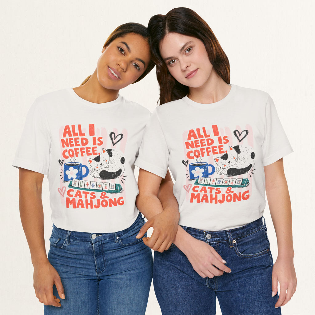 Couple wearing vintage white All I Need Is Coffee, Cats and Mahjong cat t-shirts