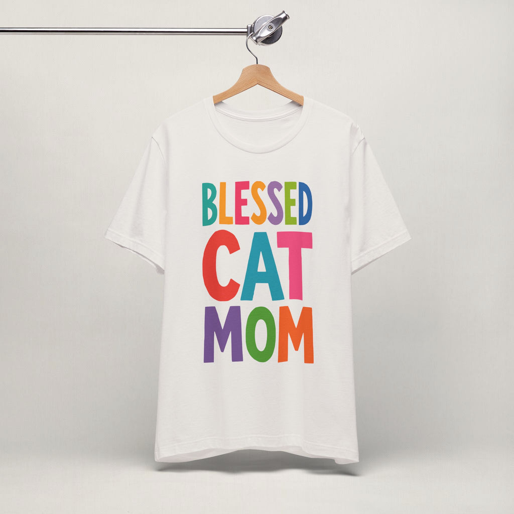 Vintage white Blessed Cat Mom cat t-shirt on a hanger