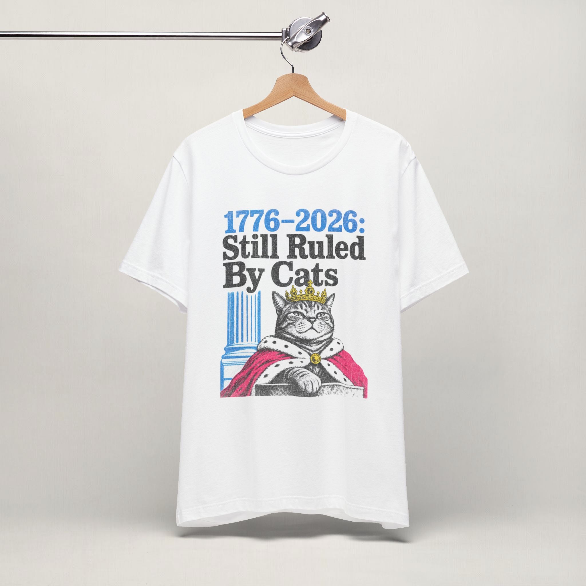 Close-up of Ruled By Cats print on white unisex t-shirt