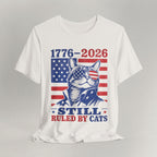 Flat lay of vintage white graphic cat t-shirt with Still Ruled By Cats patriotic cat design
