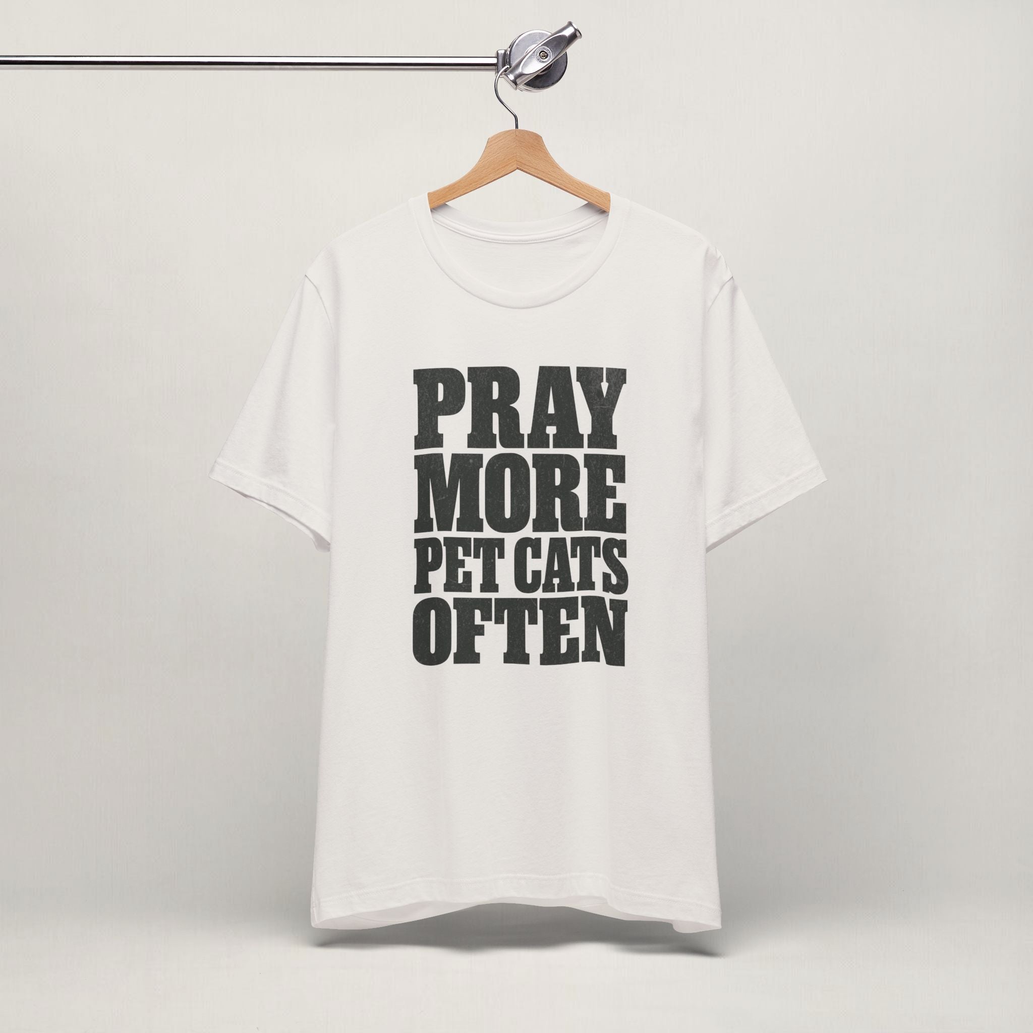 Vintage white Pray More, Pet Cats Often cat t-shirt on a hanger