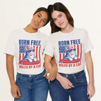 Styled flat lay of vintage white Born Free Ruled By A Cat graphic tee