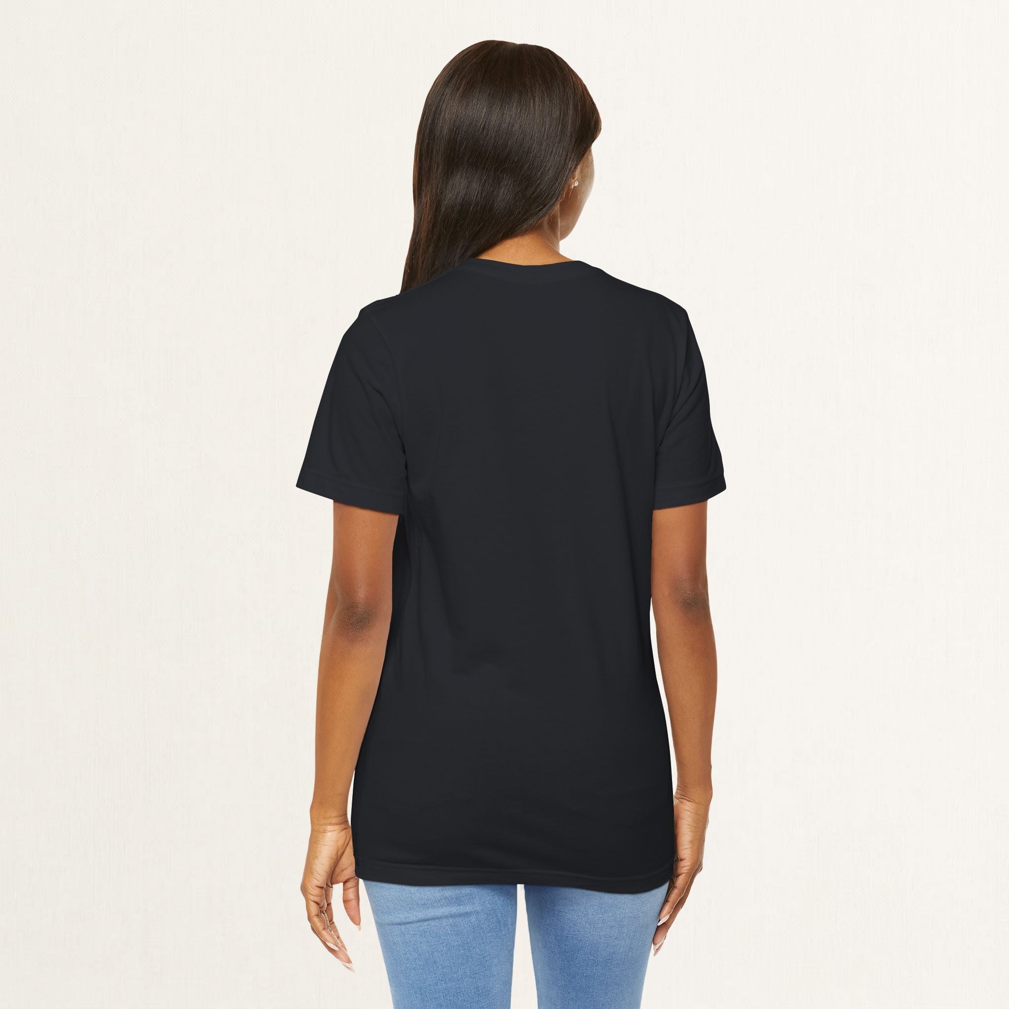 Woman wearing a vintage black All Plants Are Edible cottagecore cat t-shirt, back view