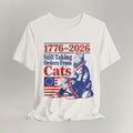 Flat lay of vintage white graphic cat t-shirt with Still Taking Orders From Cats print design