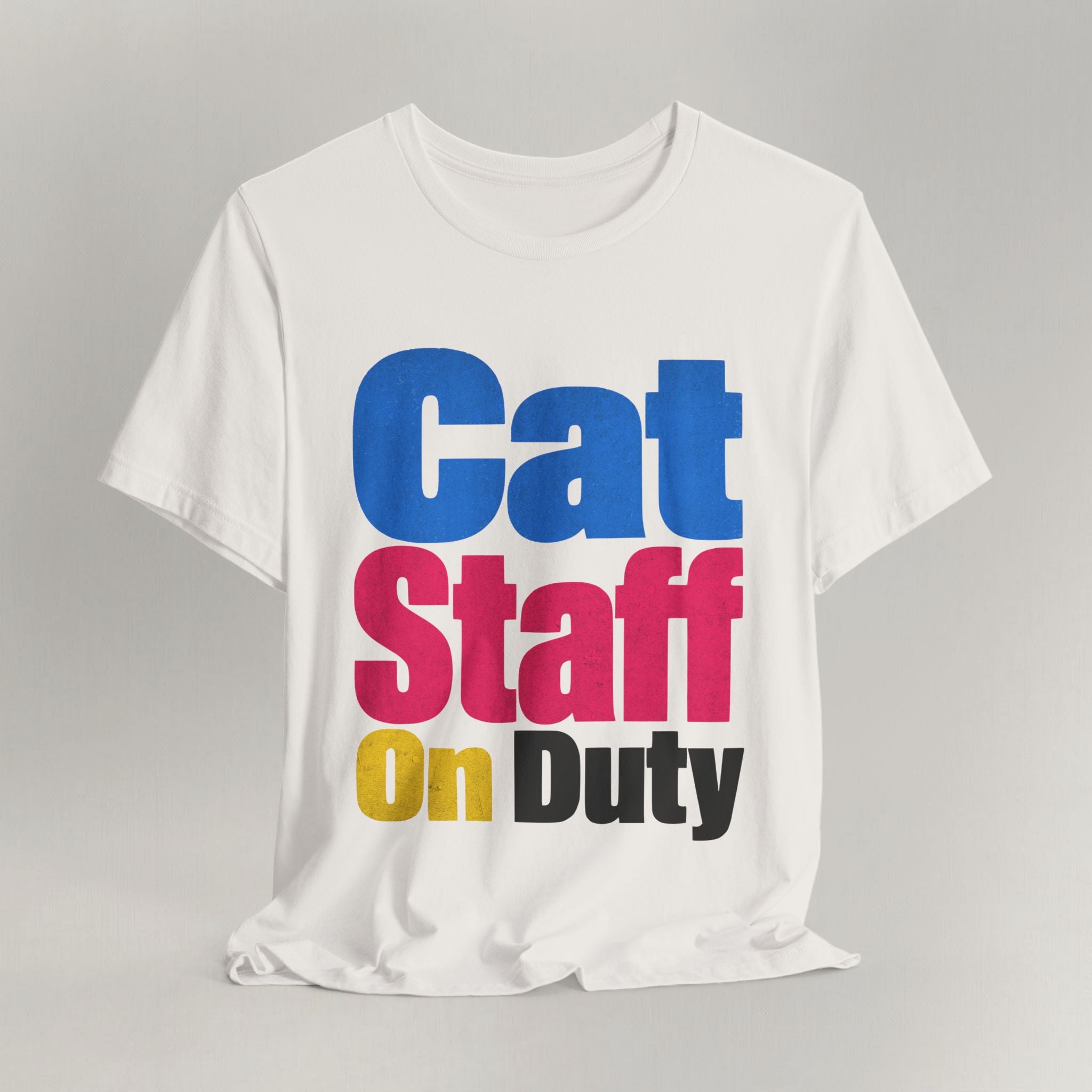 Flat lay of vintage white graphic cat t-shirt with Cat Staff On Duty print design