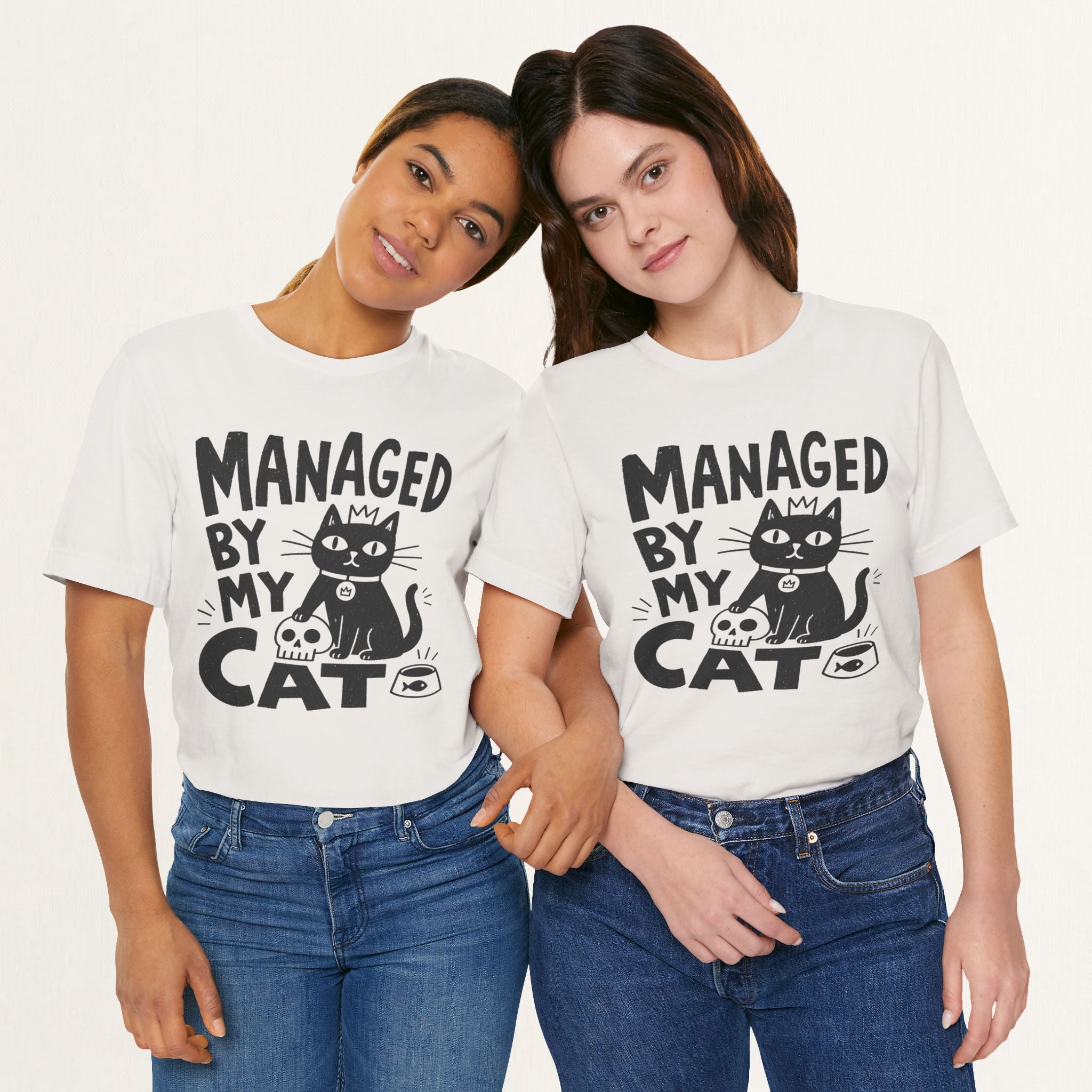 Two women wearing vintage white Managed By My Cat graphic t-shirts