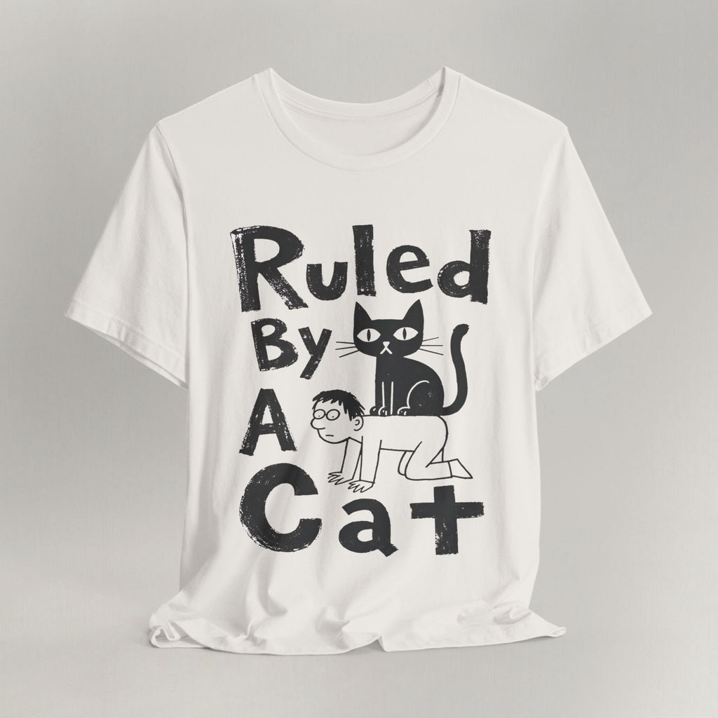 Flat lay of vintage white graphic cat t-shirt with Ruled By A Cat print design