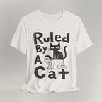 Flat lay of vintage white graphic cat t-shirt with Ruled By A Cat print design
