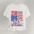 Flat lay of vintage white graphic cat t-shirt with Still In Charge patriotic cat design