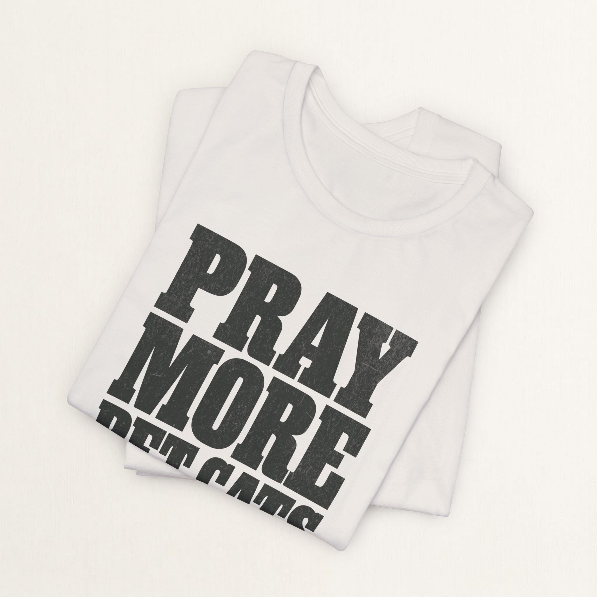 Folded vintage white Pray More, Pet Cats Often cat t-shirt