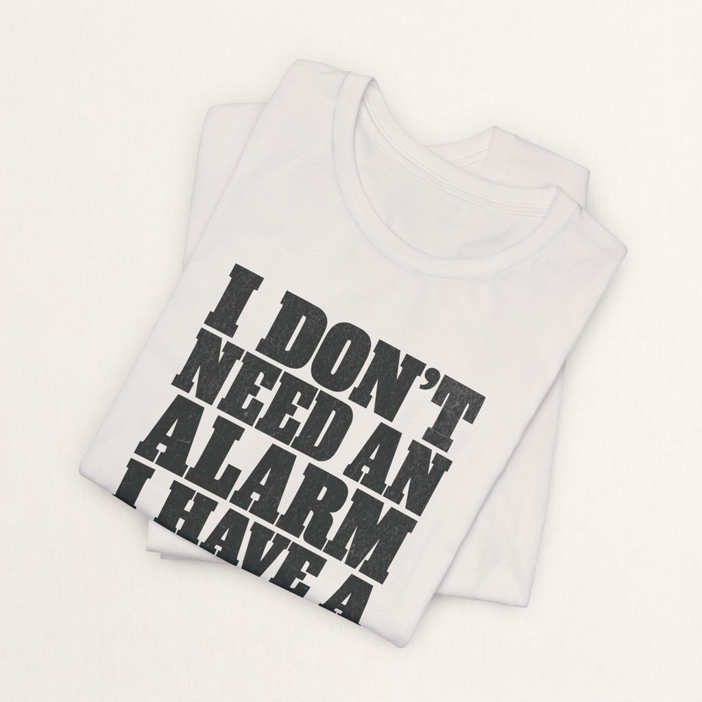 Folded vintage white I Don't Need An Alarm cat t-shirt