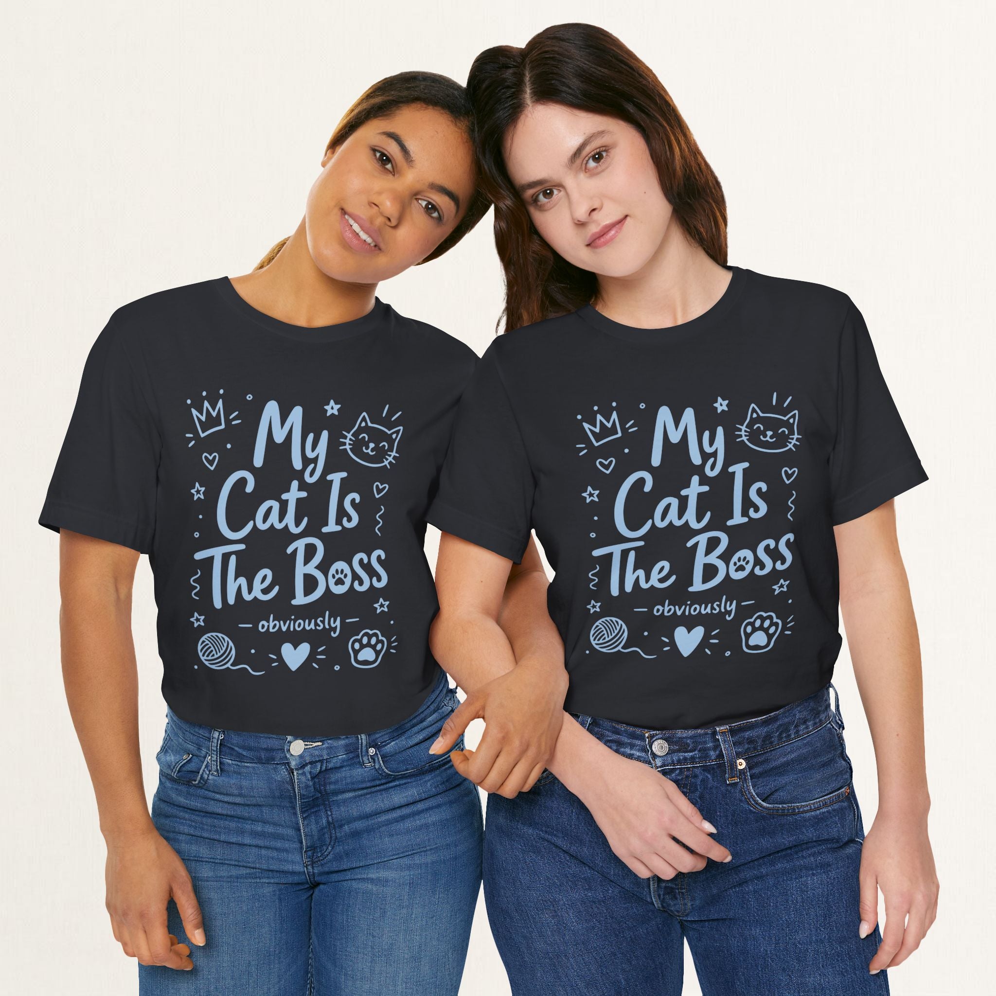 Styled flat lay of vintage black The Boss Obviously cat graphic tee