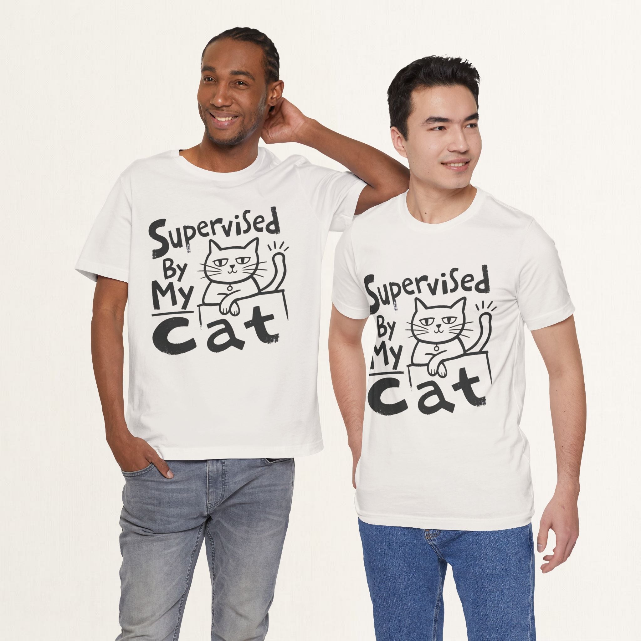 Two men wearing vintage white Supervised By My Cat t-shirts with hand-drawn cat sketch