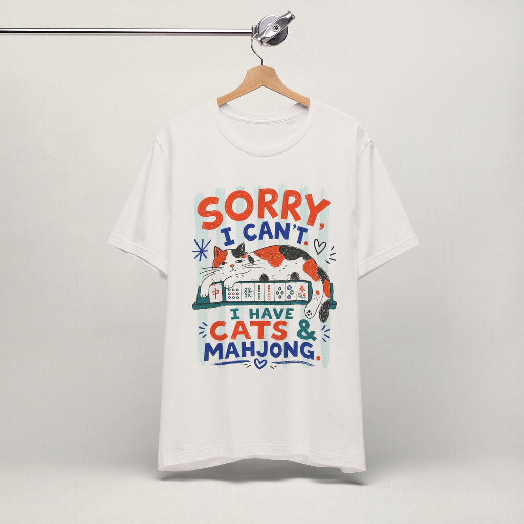 Vintage white Sorry I Can't I Have Cats and Mahjong cat t-shirt on a hanger