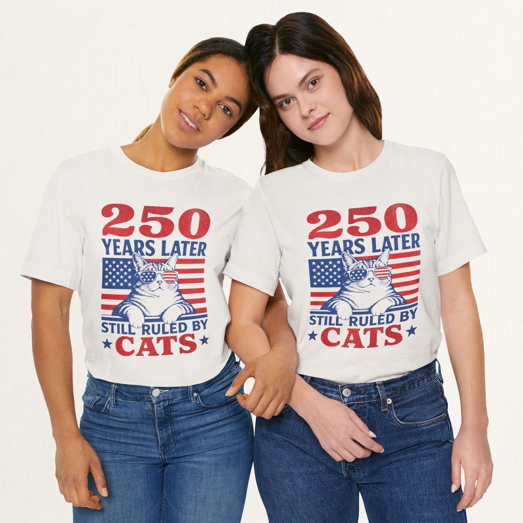 Styled flat lay of vintage white 250 Years Later patriotic cat graphic tee