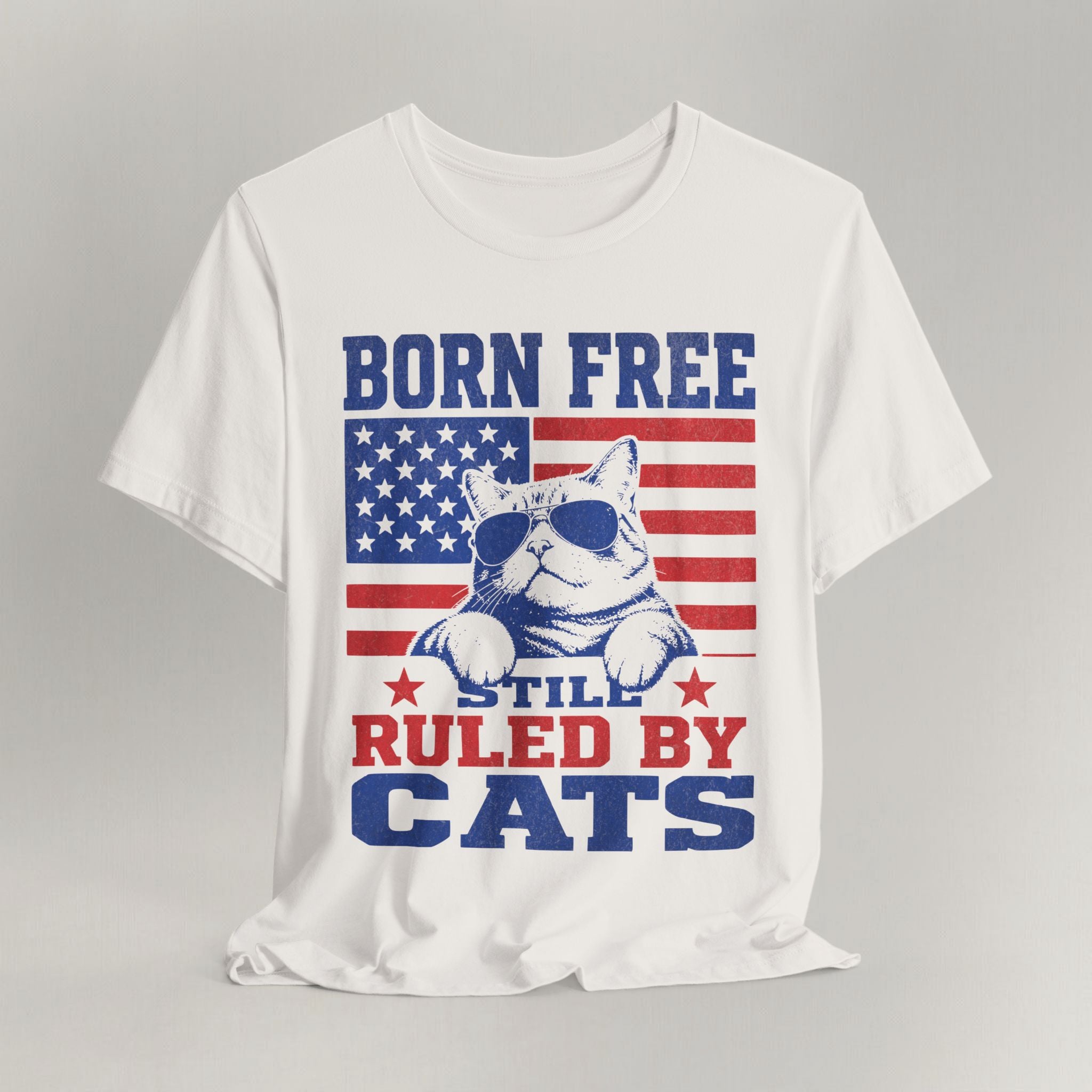 Flat lay of vintage white patriotic cat t-shirt with Born Free print design