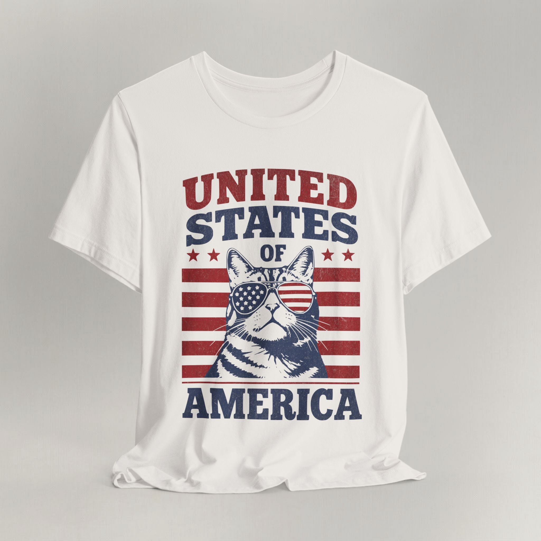 Flat lay of vintage white patriotic cat t-shirt with United States Of America print design