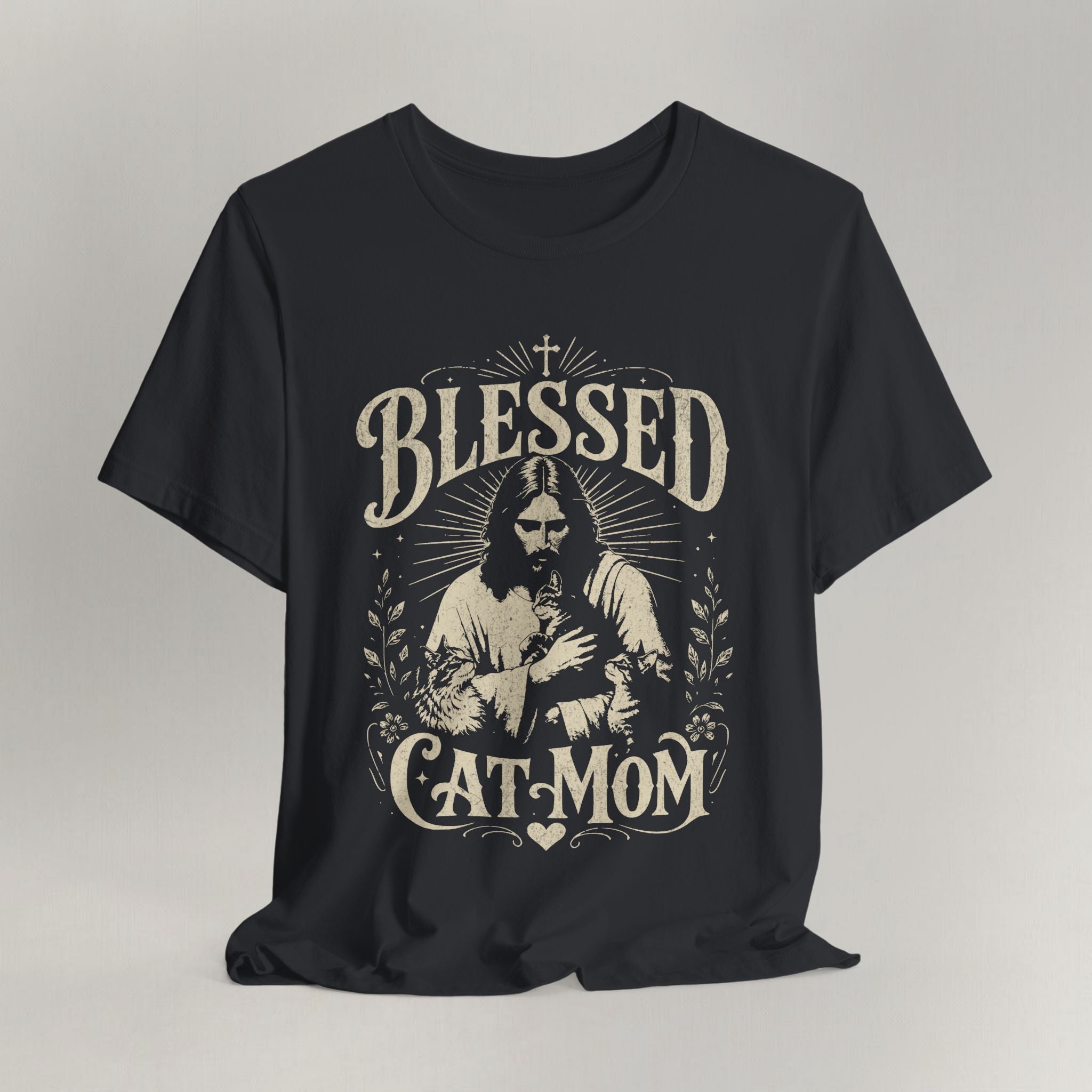 Vintage black cat t-shirt with a printed Blessed Cat Mom design, shown flat