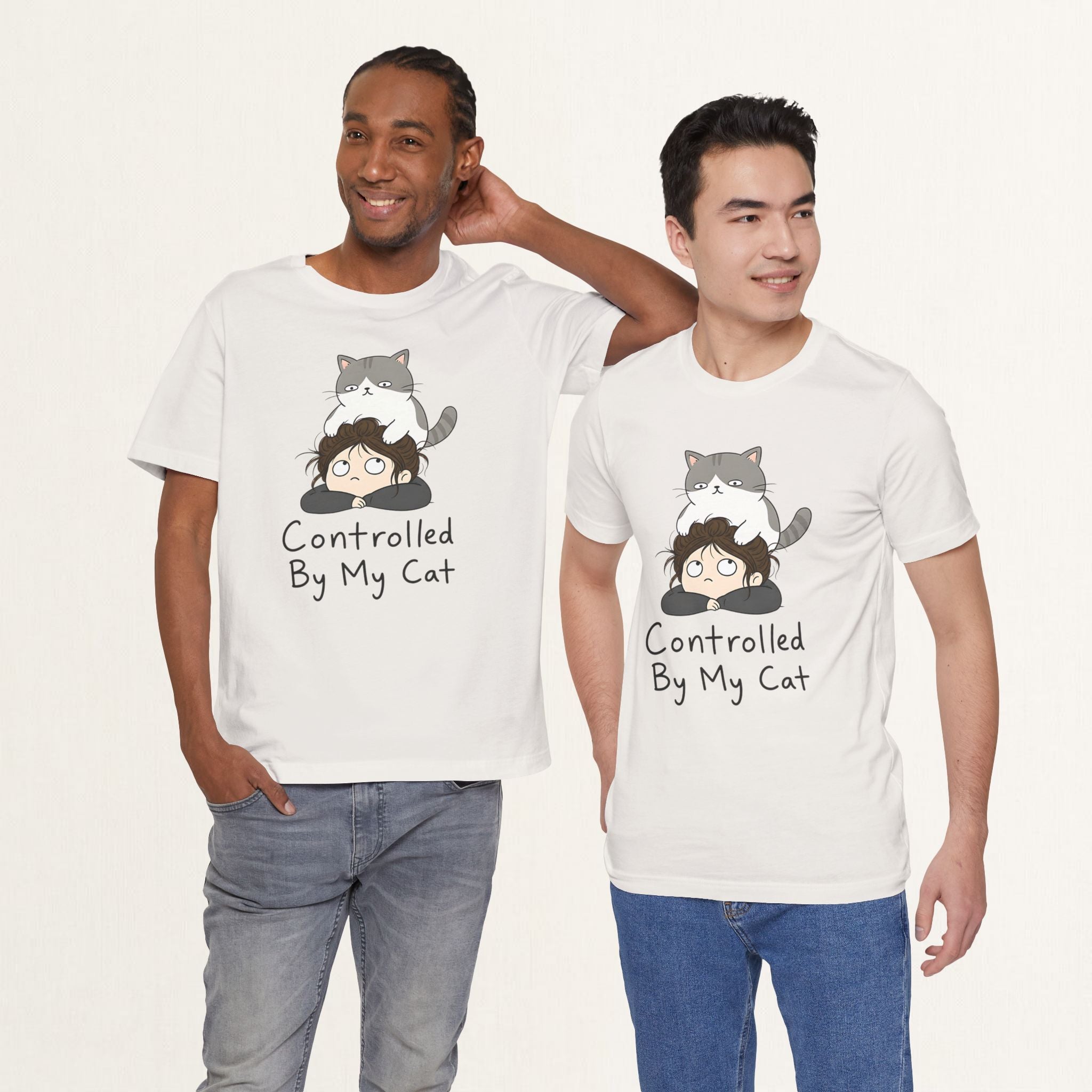 Model wearing vintage white Controlled By My Cat graphic cat t-shirt