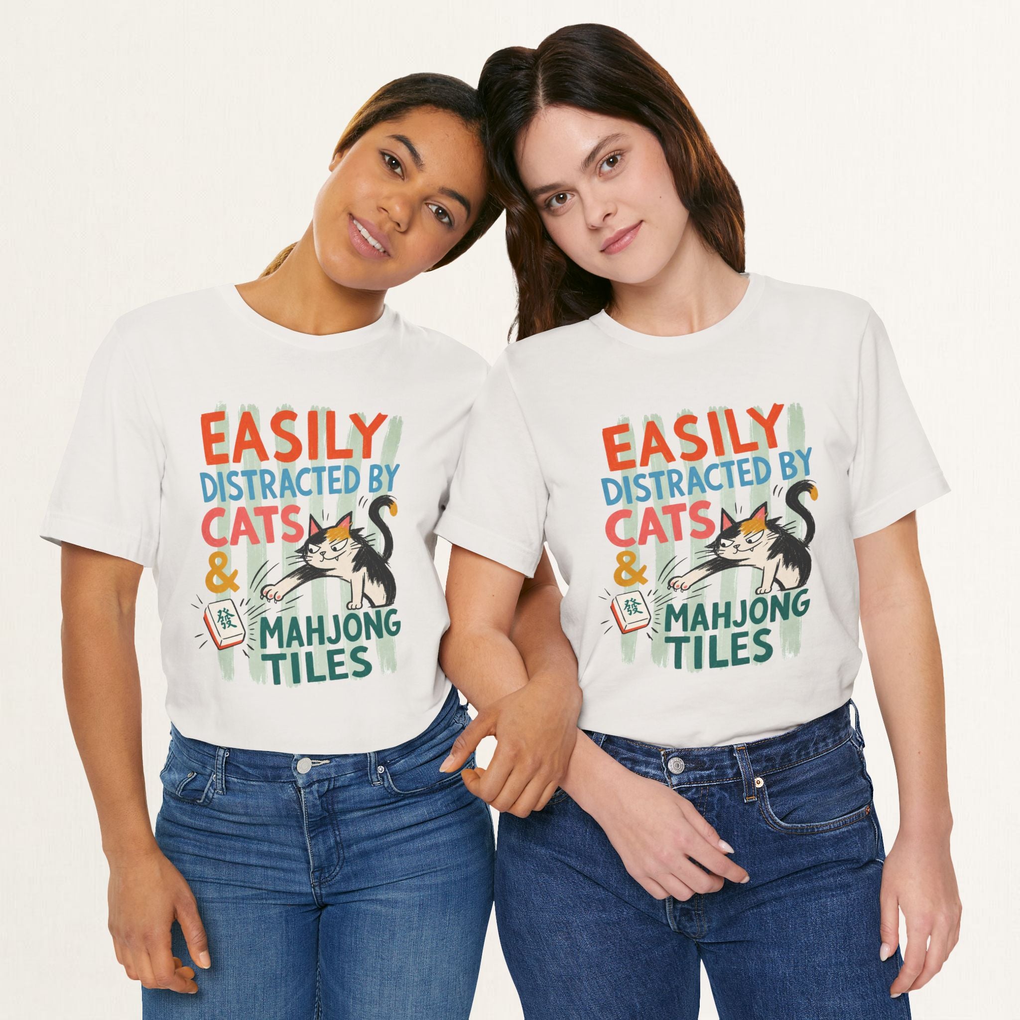 Couple wearing vintage white Easily Distracted by Cats and Mahjong cat t-shirts