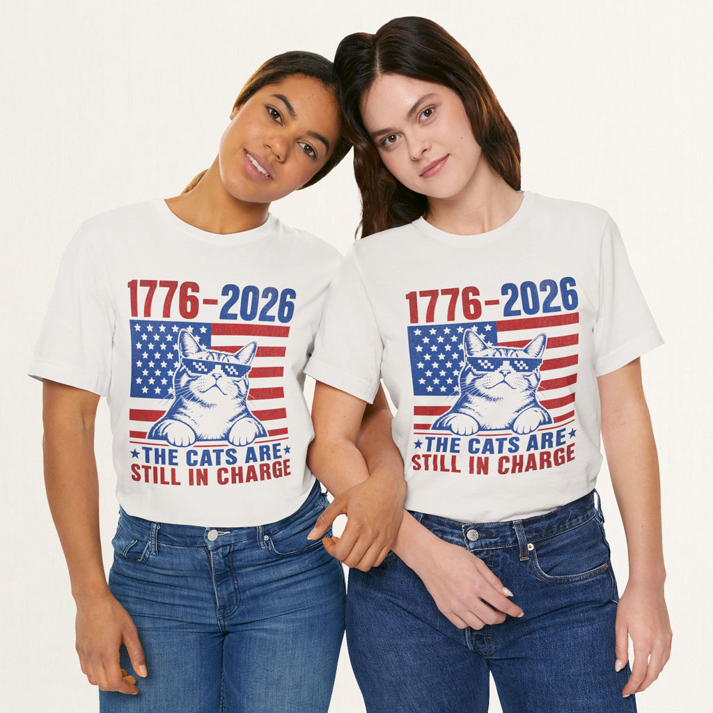 Styled flat lay of vintage white The Cats Are Still In Charge cat graphic tee