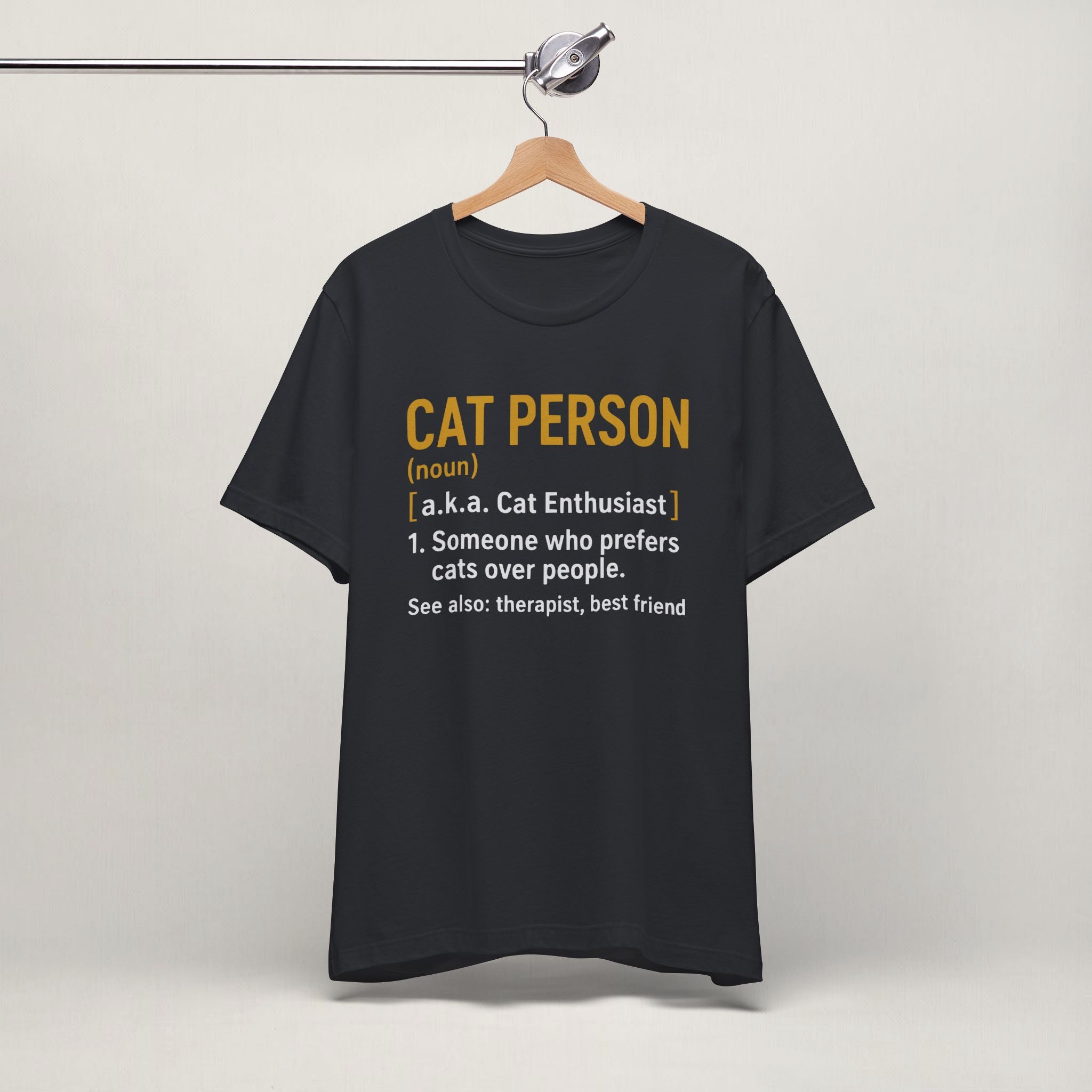 Vintage black Cat Person cat t-shirt on a hanger
