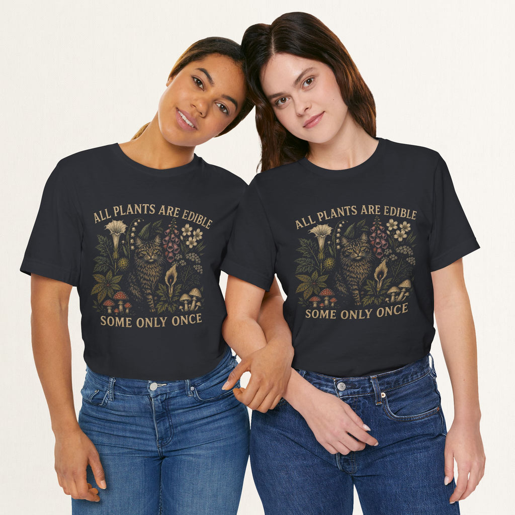 Couple wearing vintage black All Plants Are Edible cottagecore cat t-shirts