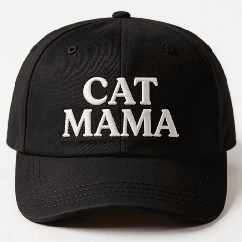 Black embroidered cap with white text that says “Cat Mama” shown from the front