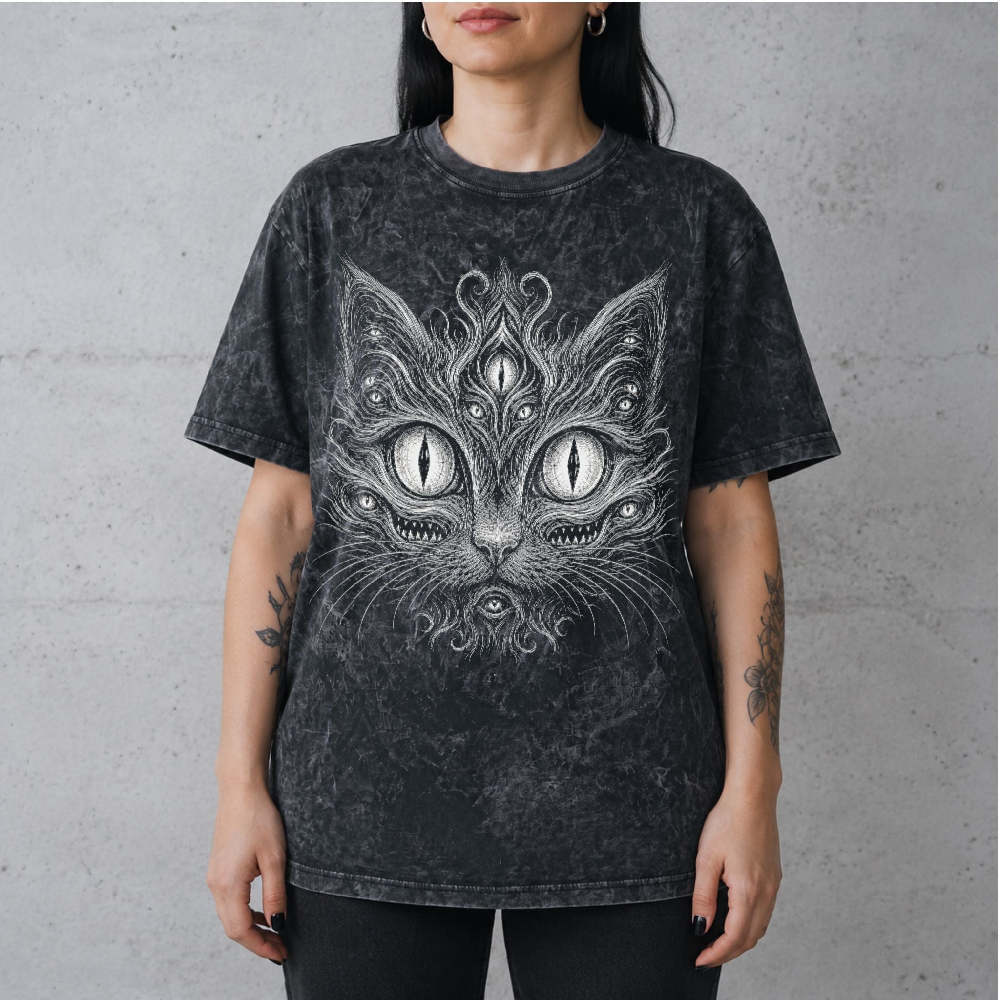 Horror Cat Vintage Tee with surreal many-eyed cat graphic on female model