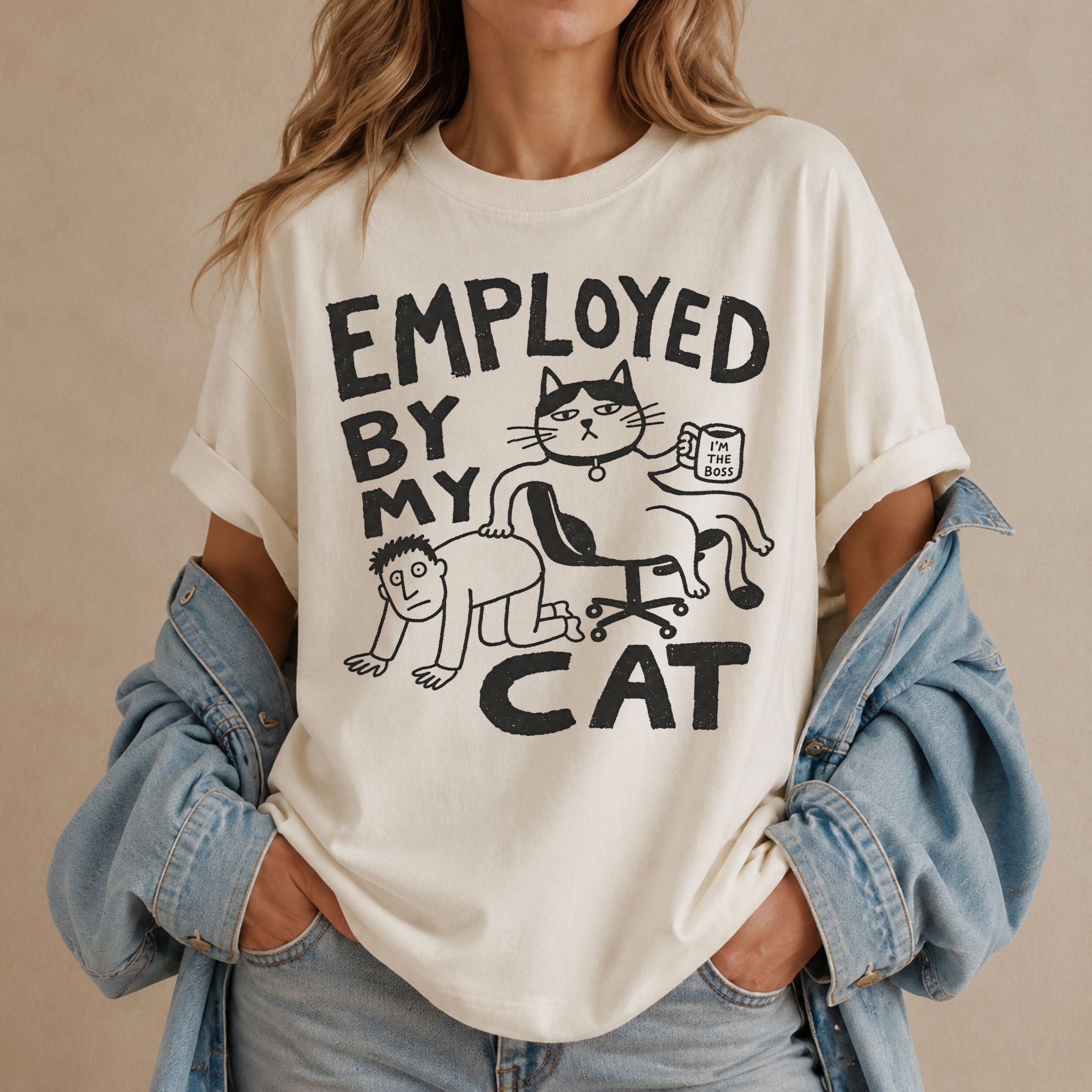 Employed By My Cat T-Shirt in ivory with illustrated cat graphic on female model