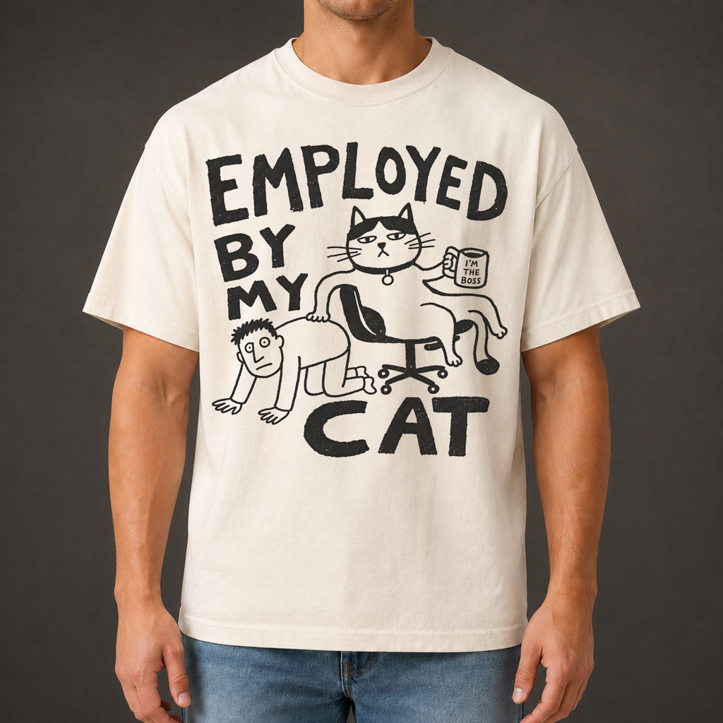 Employed By My Cat T-Shirt in ivory with illustrated cat graphic on male model