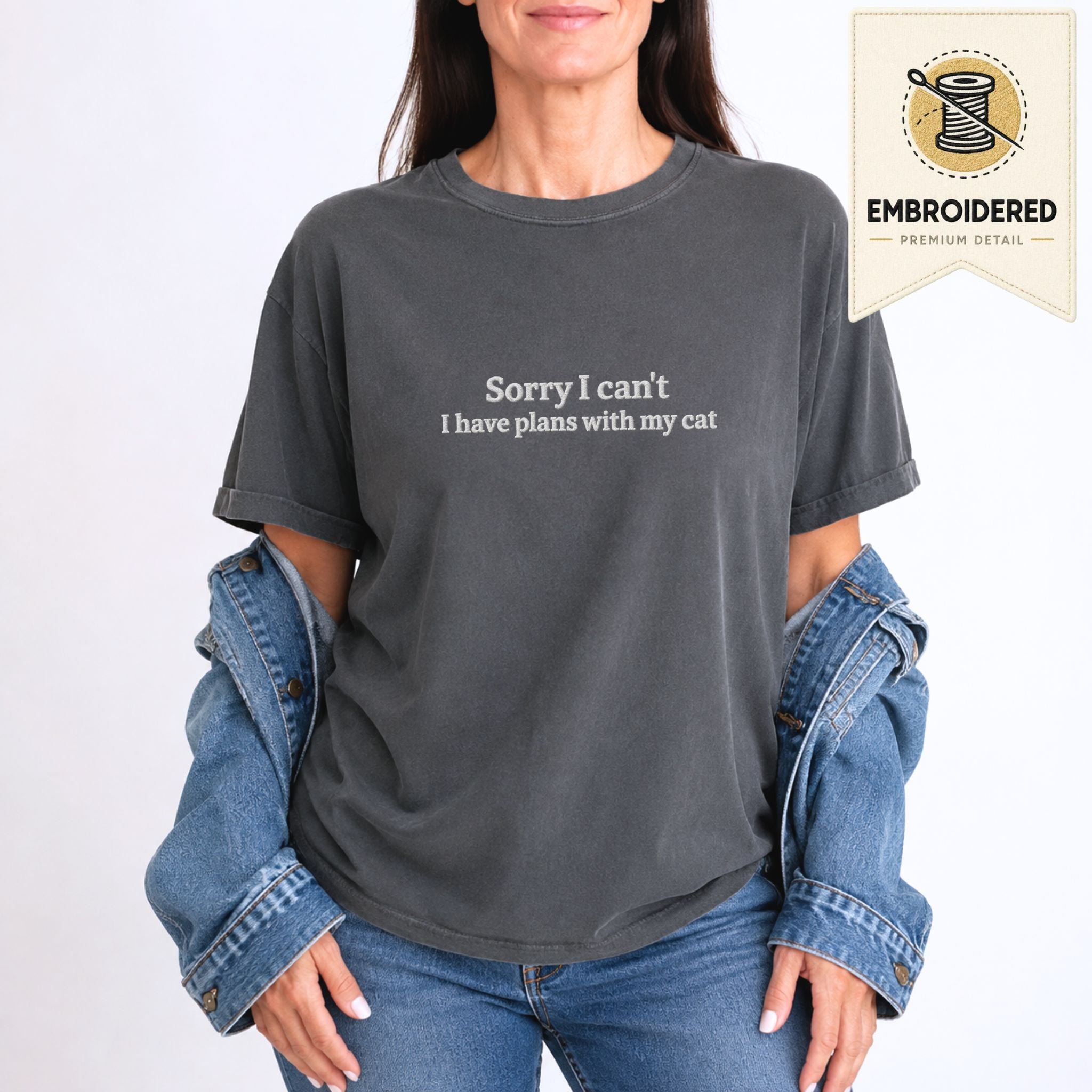 Woman wearing a pepper embroidered 'Sorry I Can't' t-shirt