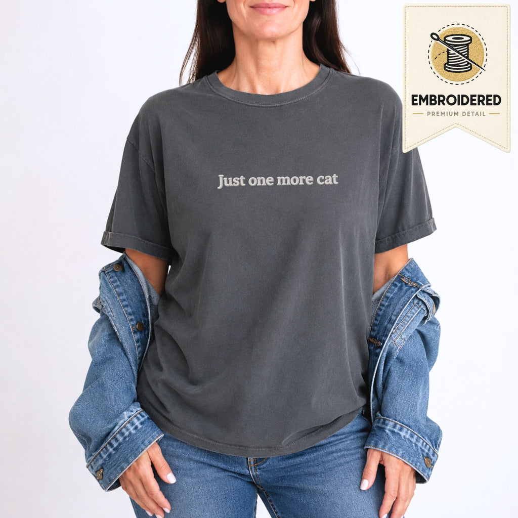 Woman wearing a pepper embroidered 'Just One More Cat' t-shirt